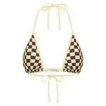 Yellow and brown checkered bikini top with yellow straps on a white background.