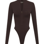 A dark brown long-sleeve bodysuit with a half-zip neckline and a small logo on the left chest, displayed on a clean white background.