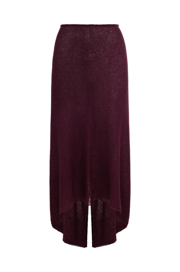 A burgundy knit midi skirt with a high-low hemline, displayed against a solid white background.