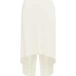 Ivory knit midi skirt with a V-back and draped, asymmetrical hem, shown against a plain white background.