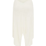 Ivory knit midi skirt with a V-back and draped, asymmetrical hem, shown against a plain white background.