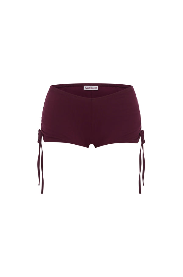 Micro burgundy shorts with side tie details, shown against a plain white background.